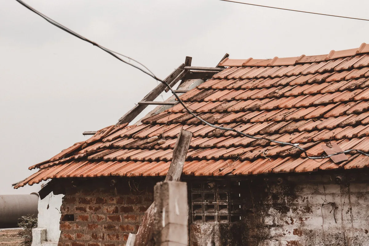 Aging clay tile roof in need of repair